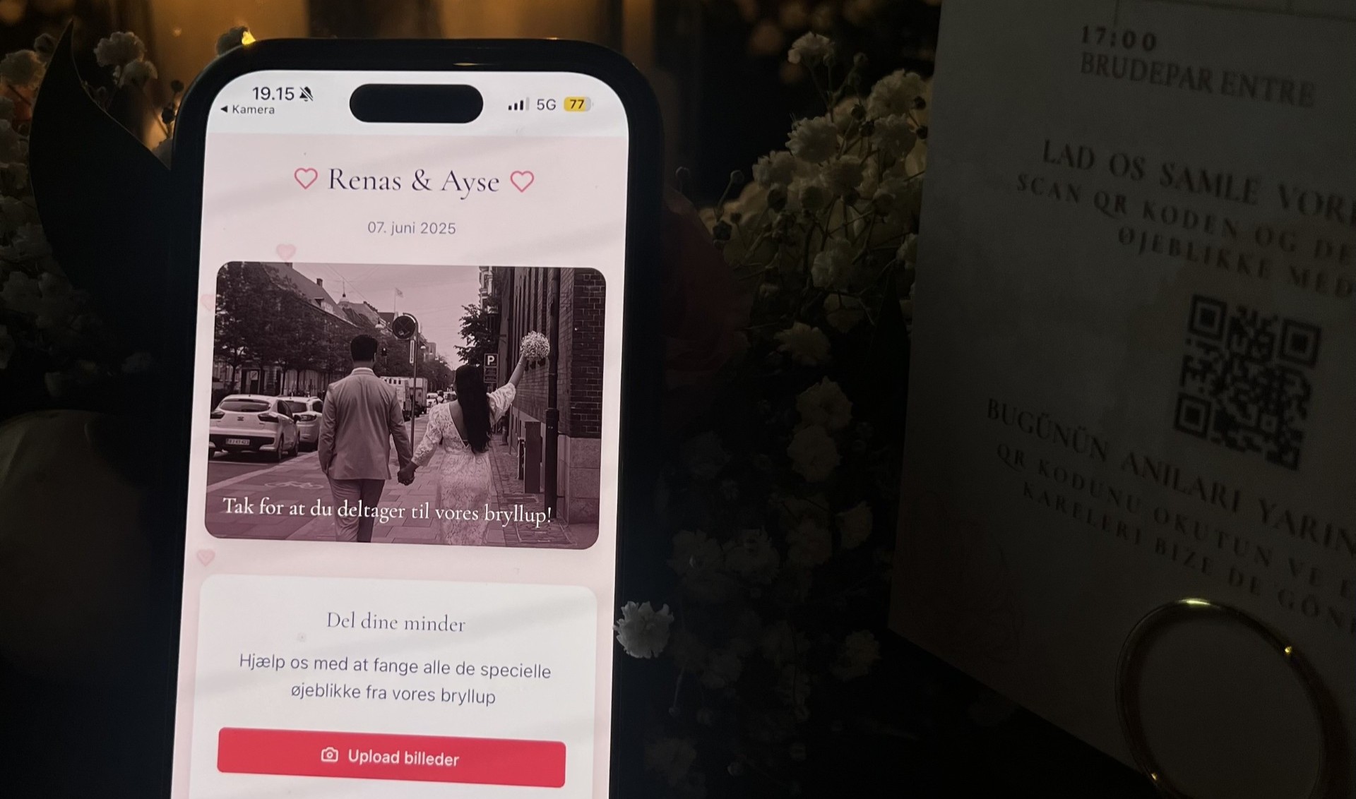 QR code placed on wedding table for guests to scan and upload photos